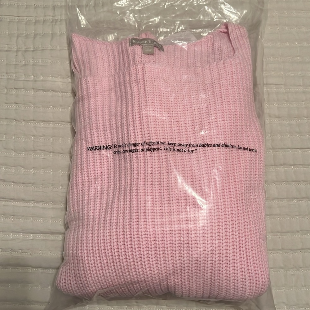 NWOT woman pinky sweater